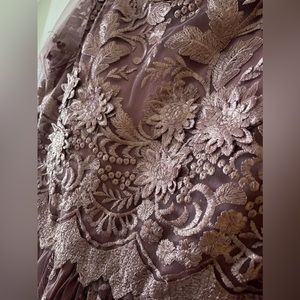 Pink detailed party wear dress.